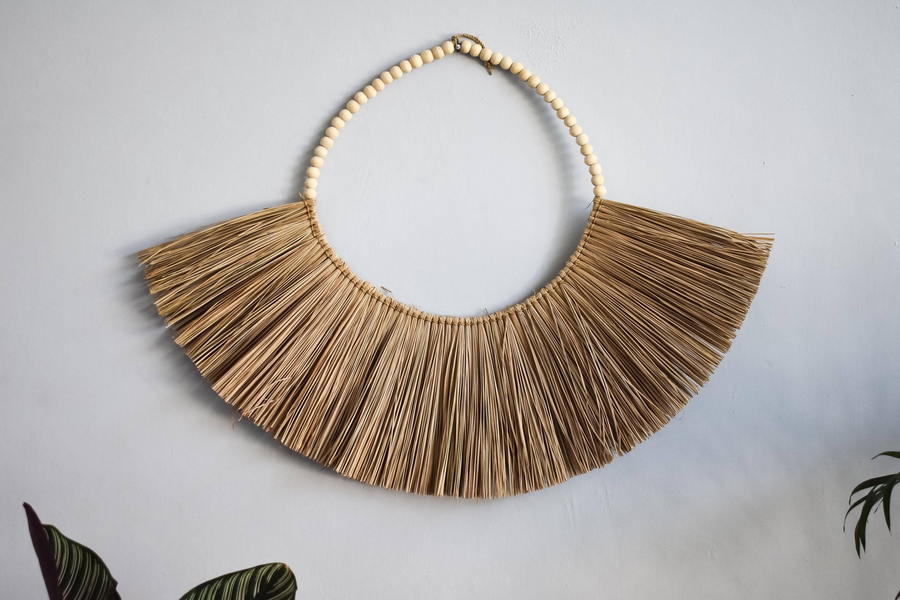 Raffia wall hanging with wooden beads - Joglo Living