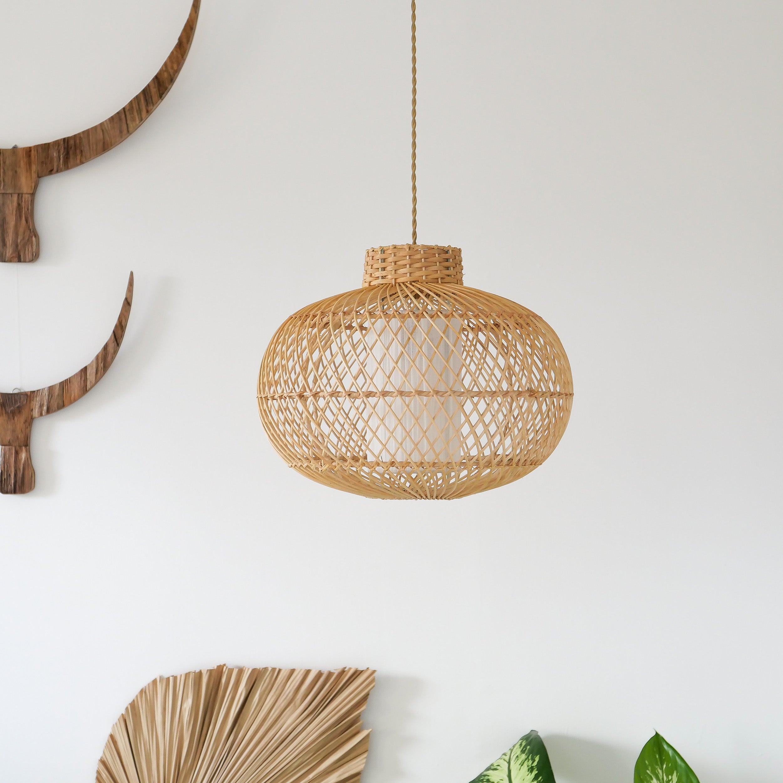 Rattan pendant light with inner fabric diffuser