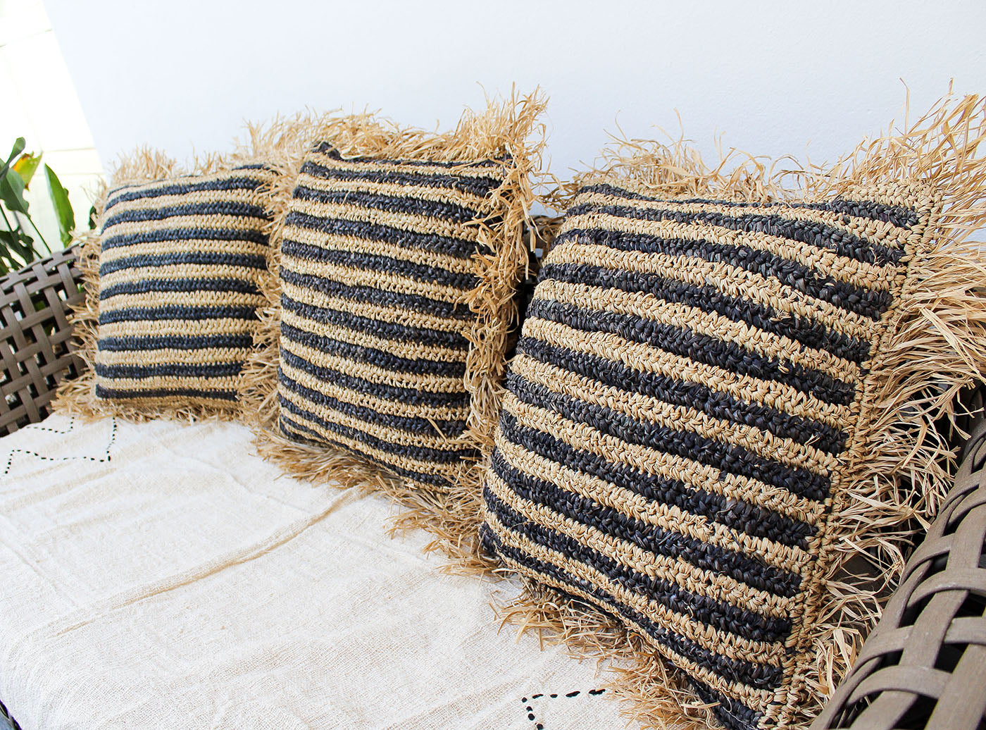 Sunda - raffia pillow cover with black stripe