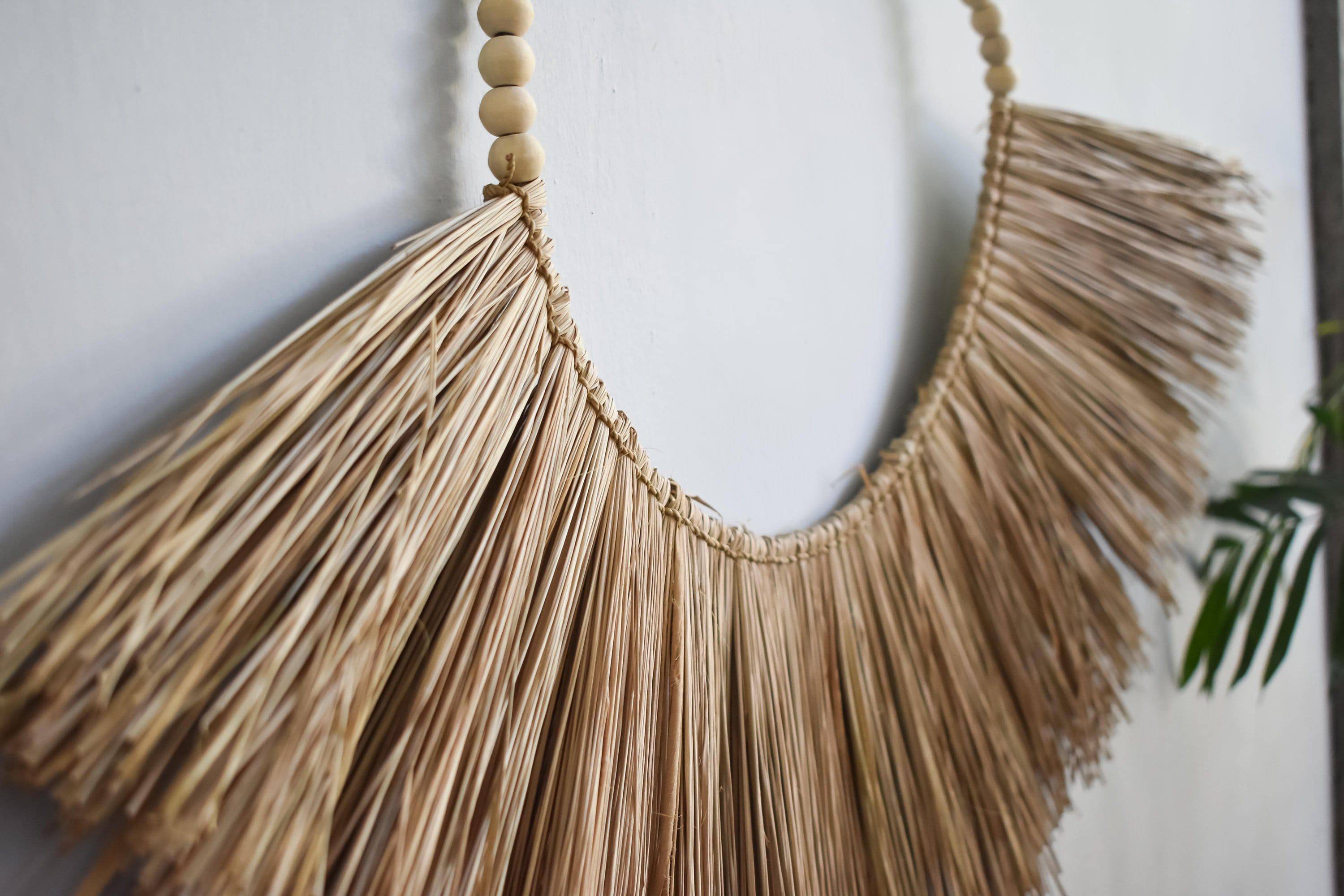 Raffia wall hanging with wooden beads - Joglo Living