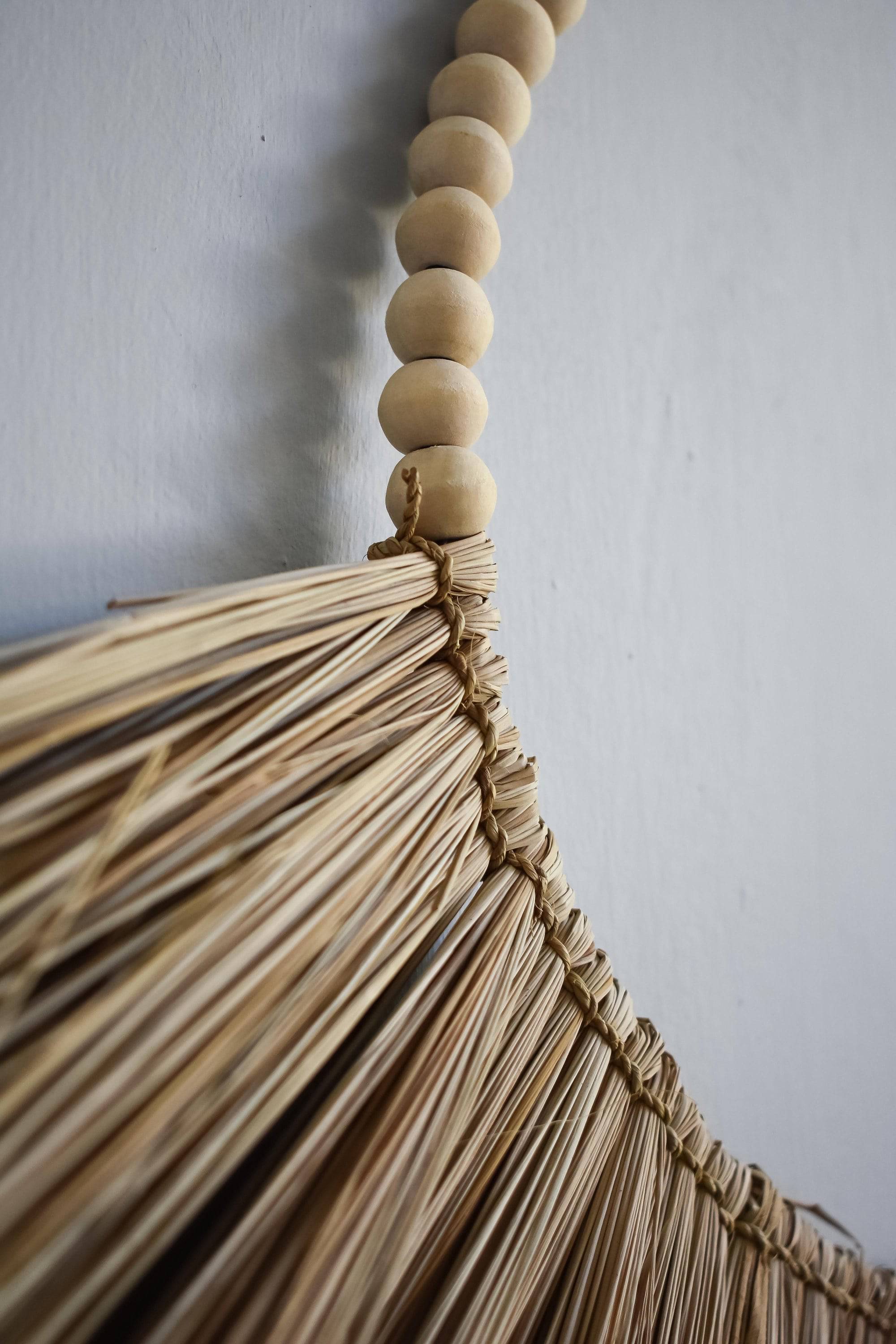 Raffia wall hanging with wooden beads - Joglo Living